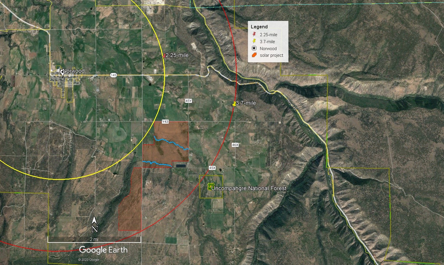 Figure 3 – Google Earth aerial imagery depicting town of Norwood, proposed solar Project, and distance 2.25- (yellow) and 3.7-mile (red) radii from Norwood. Imagery is dated August 25, 2019. (Source: Google Earth, 2023. Accessed, September 23, 2023.)